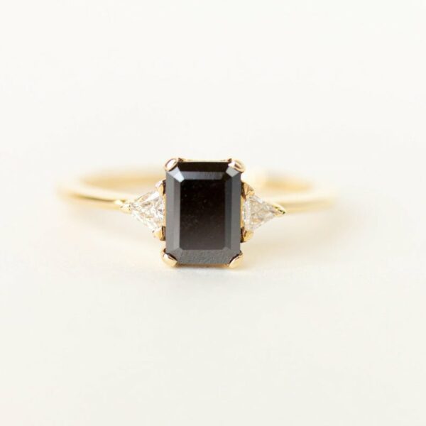 three-stone black diamond ring