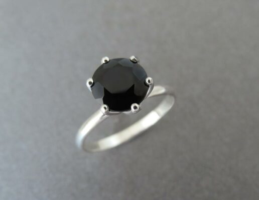 solitaire black diamond engagement ring