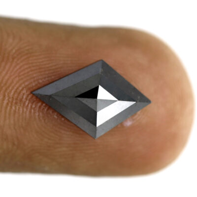 Kite black diamond on finger