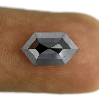 Elongated hexagon black diamond on finger